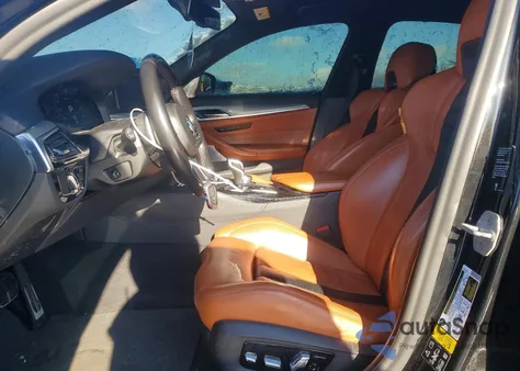 2021 BMW M5 z USA, uszkodzony, nr VIN WBS83CH04MCG83482